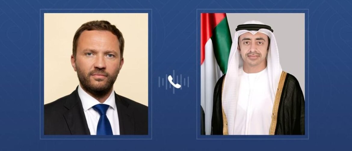 Two framed portrait photos side by side on a blue background with a phone icon between them, suggesting a call between two people.