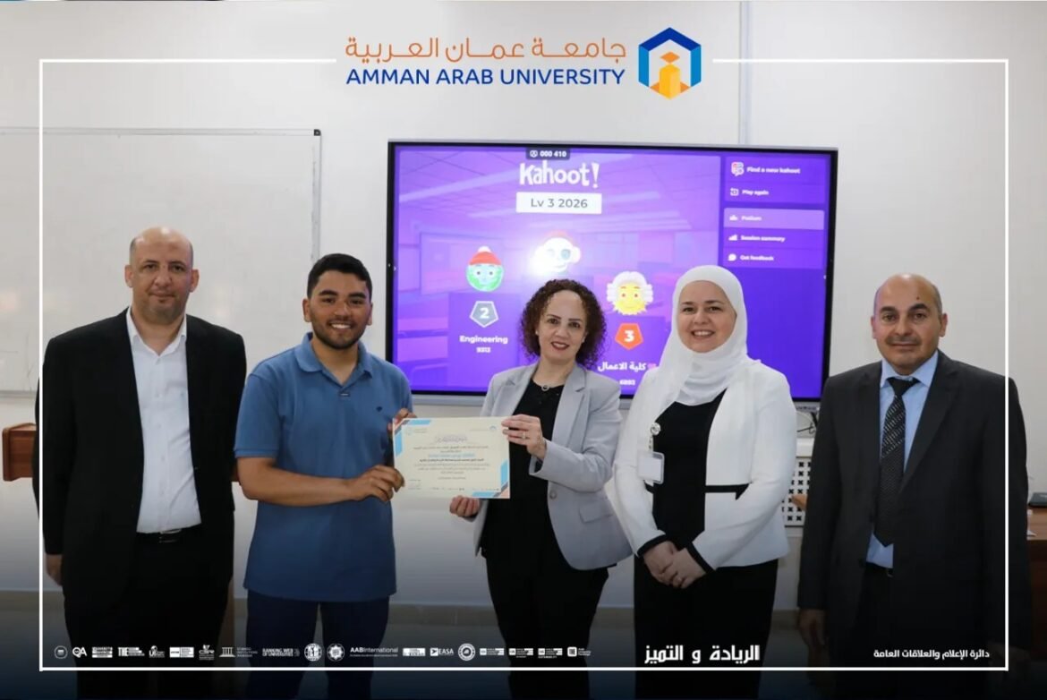 Group of five adults standing in a classroom, one student receiving a certificate as others pose, with a Kahoot! screen in the background at Amman Arab University.