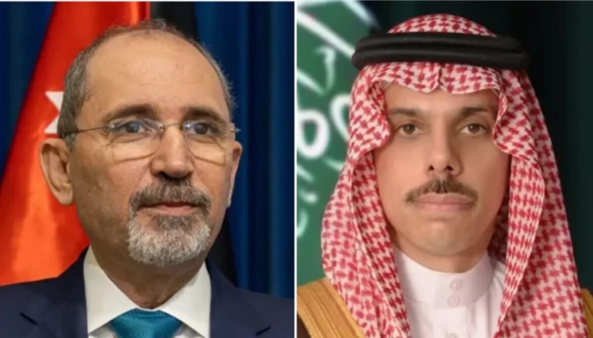 Two men pictured side by side: left a middle-aged man with glasses and a gray beard in a dark suit and turquoise tie; right a man in traditional Saudi attire (keffiyeh and agal with white thobe).