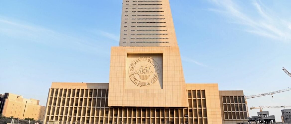 Tall beige bank tower with a large square section featuring a circular bank emblem on the façade.