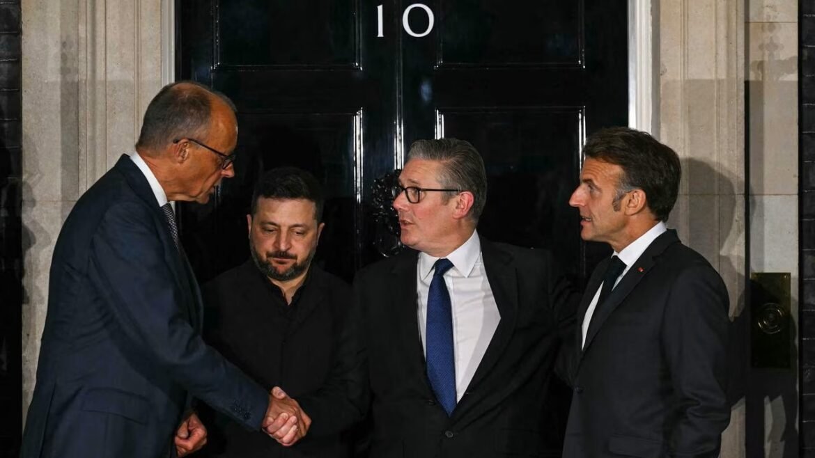 Four men in dark suits stand outside a building with a black door labeled 10, as the center pair shake hands and the others look on.