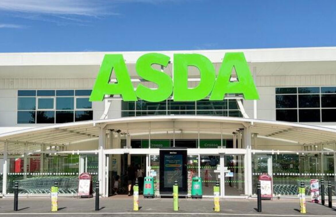 Front entrance of an ASDA supermarket with a large lime-green 'ASDA' sign above the doors.