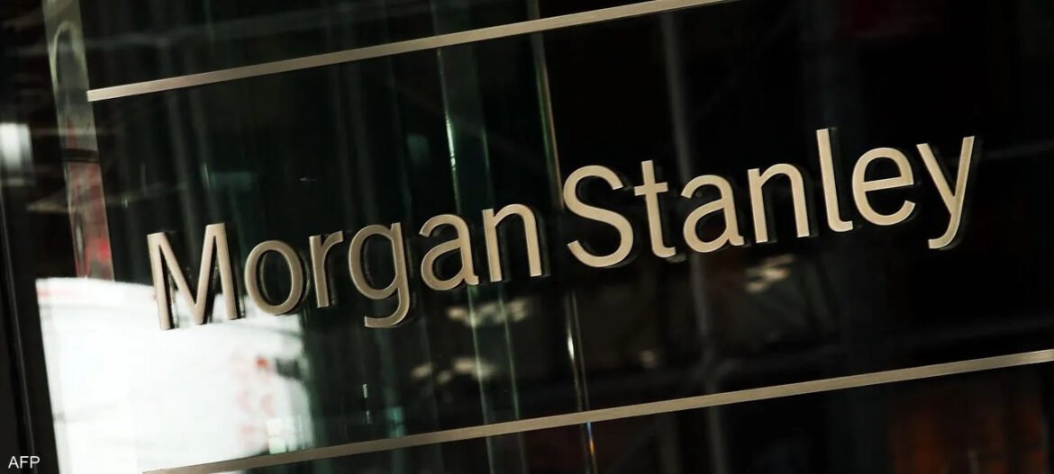Close-up of a glass wall with the words 'Morgan Stanley' in metallic lettering.