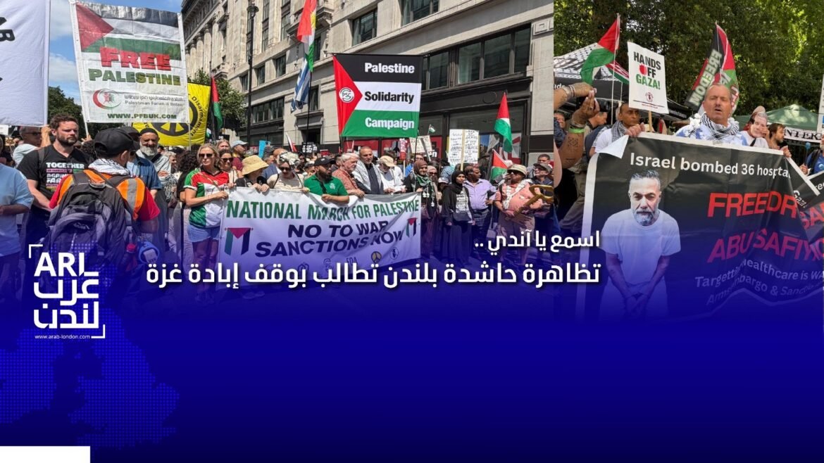 Crowd of protesters in a city street holding Palestinian banners and flags, including a large 'National March for Palestine' sign and 'Free Palestine' visuals.