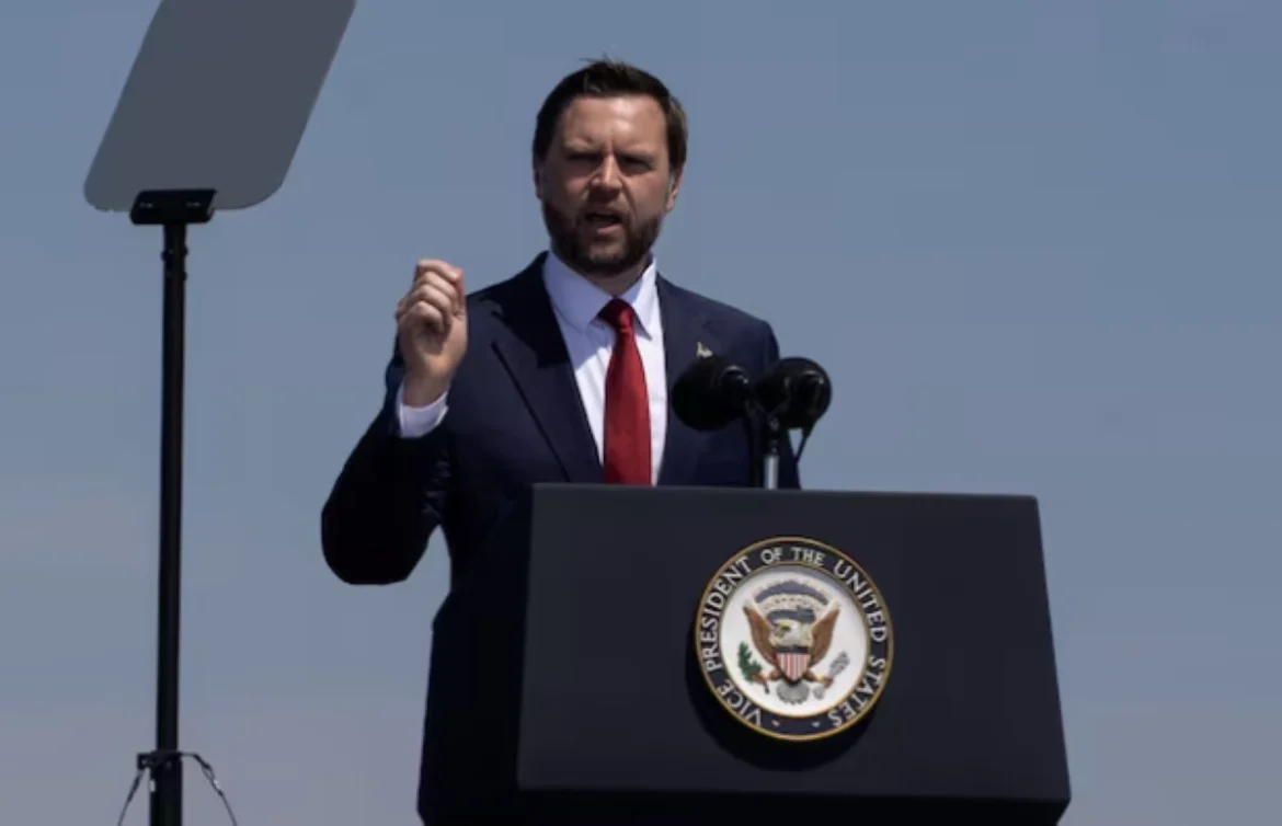 President giving a speech at a podium with the presidential seal, wearing a dark suit and red tie outdoors.