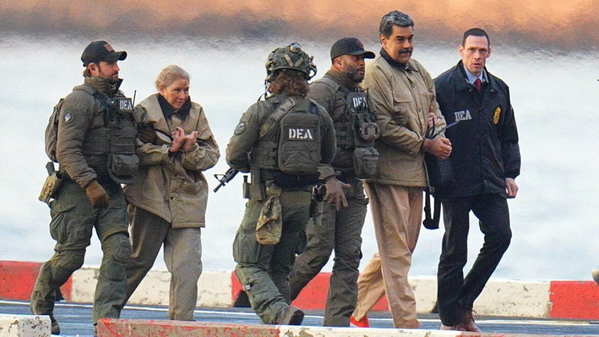 DEA agents in tactical gear escort a civilian woman along a waterfront pier by the water.