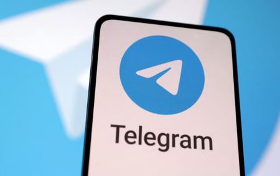 Smartphone screen displaying the Telegram logo and app name against a blue background.