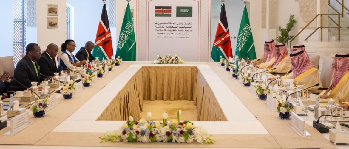 Diplomatic meeting around a U-shaped table; Kenyan and Saudi flags flank a banner about the Saudi-Kenya Political Consultations Committee.