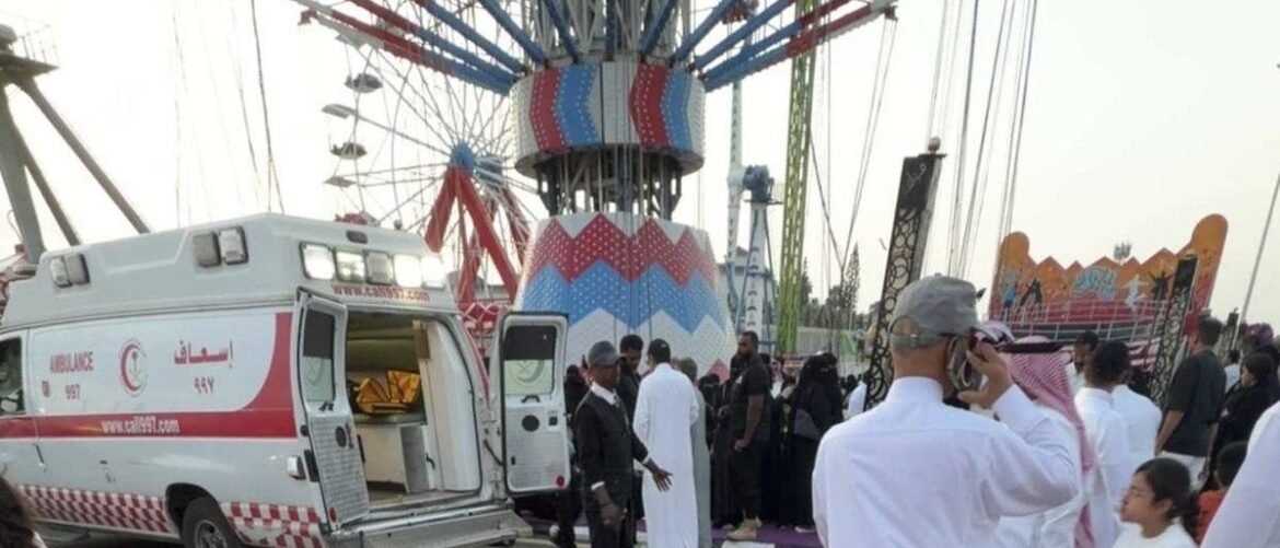 A taxi or ambulance at a crowded fairground with a large colorful Ferris wheel in the background and people walking nearby.