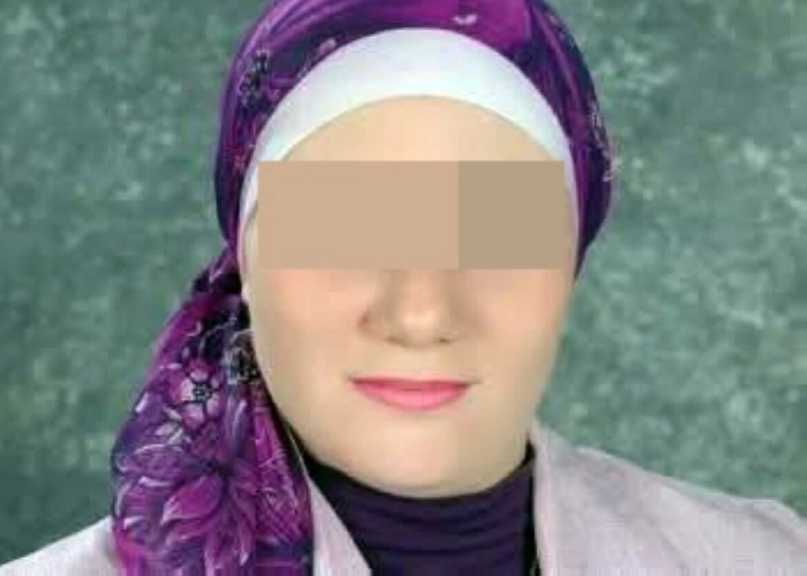 An anonymized portrait of a woman wearing a purple patterned hijab and light outfit, with her eyes obscured by a blur for privacy against a green background.