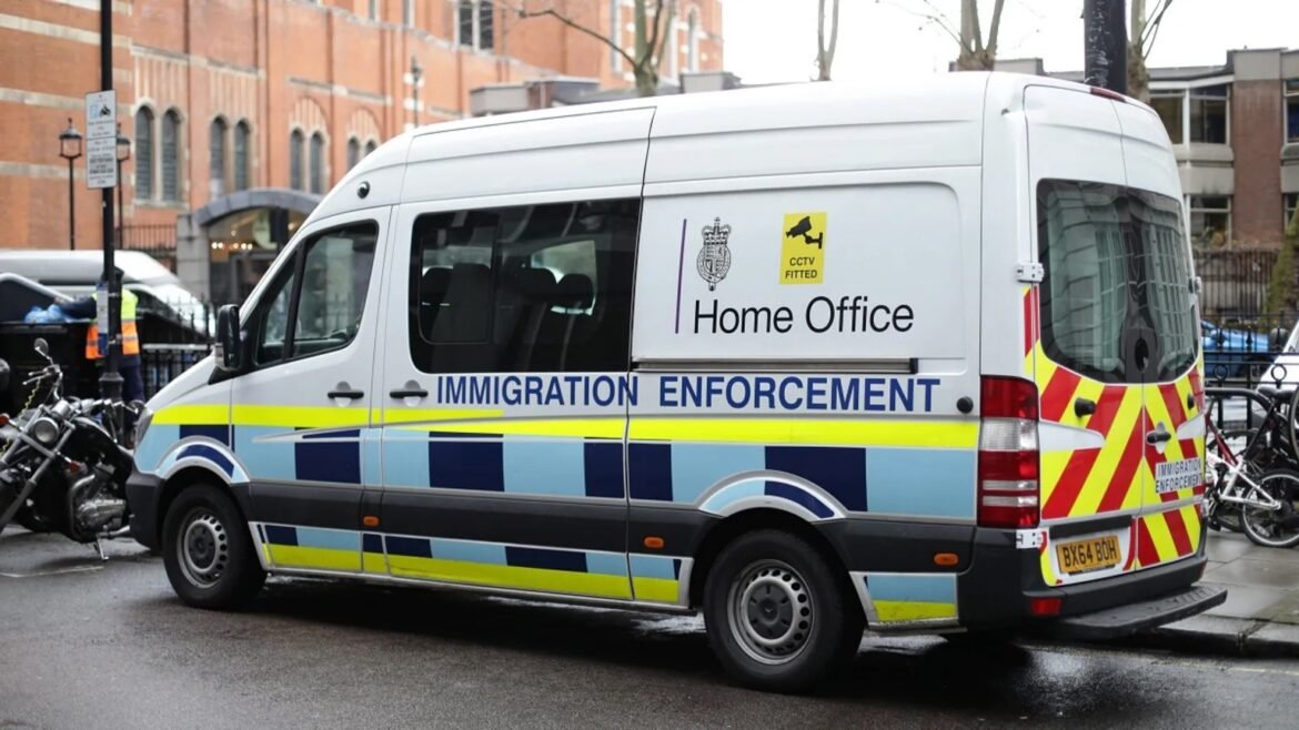 Immigration Enforcement van for the Home Office parked on a city street, with CCTV label and blue-yellow chevrons along the side.