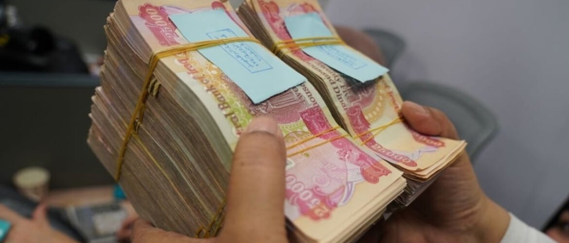 Bundles of banknotes tied with rubber bands held by hands, focused on the money exchange moment.