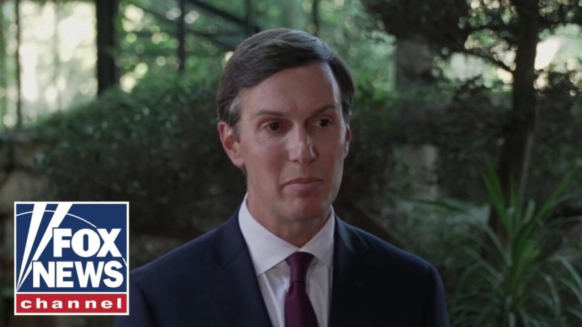 Man in a dark suit and maroon tie being interviewed outdoors, with Fox News Channel logo in the lower-left corner