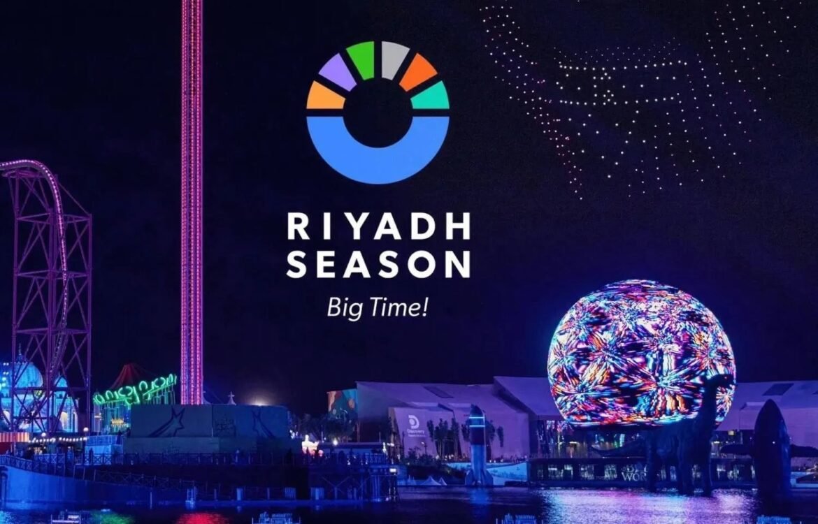 Riyadh Season promotional image: colorful circular logo, the text 'Big Time!', at night with a glowing globe sculpture and neon park rides by the water.