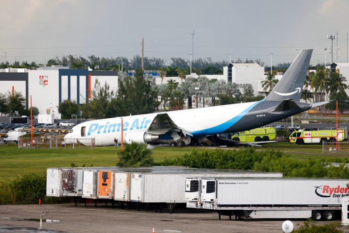 Damaged Prime Air cargo plane on the runway with emergency vehicles nearby.