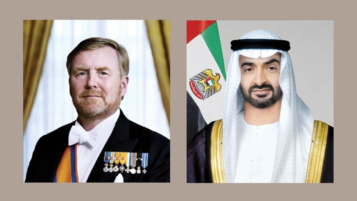 Side-by-side portraits: left man in tuxedo with medals, right man in traditional Emirati dress with UAE flag in the background.