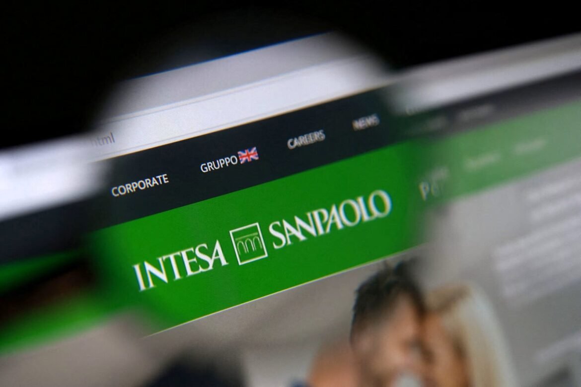 Close-up of a computer screen showing the Intesa Sanpaolo corporate website header with navigation items like Corporate, Gruppo, and Menùs on a green banner.